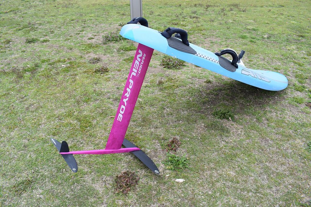 A hydrofoil with mast, fuselage, front wing and stabiliser mounted on a board